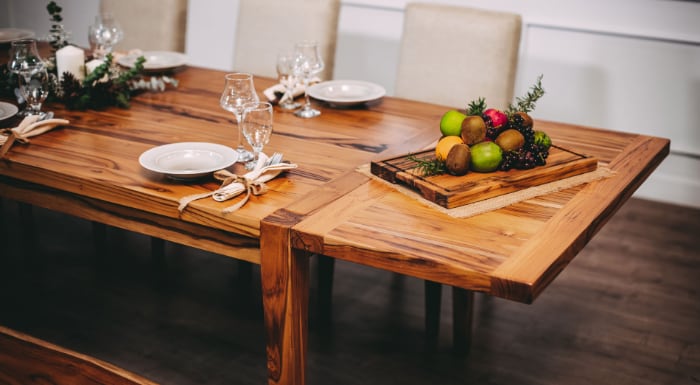 Solid dinner table made from oak or teak.